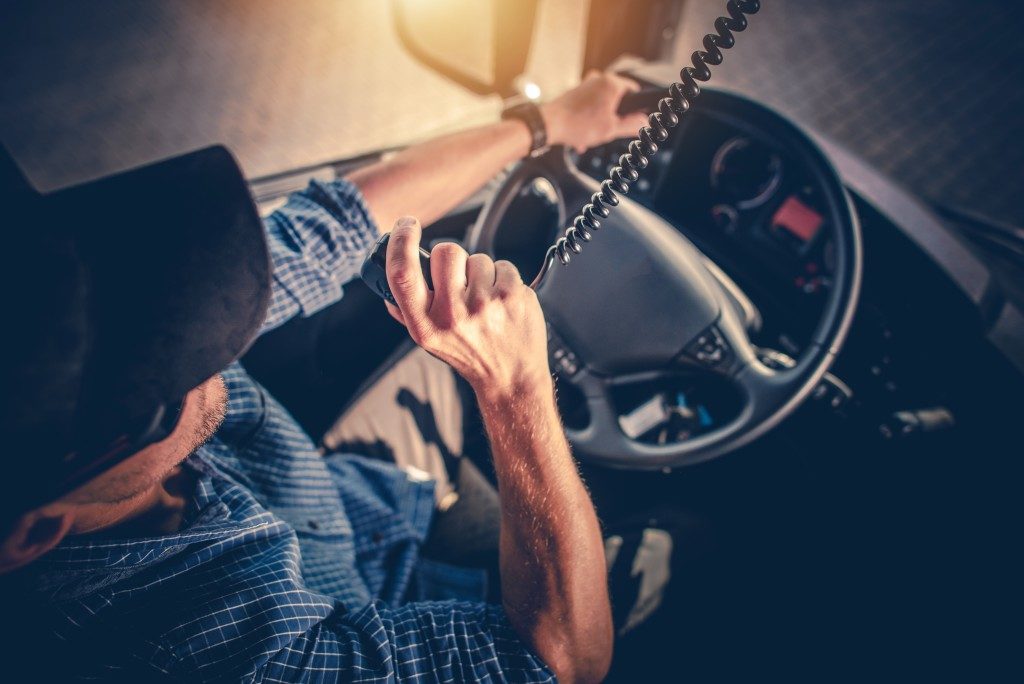 truck driver using radio