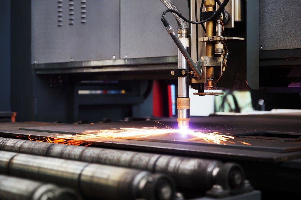 Laser cutting a metal plate