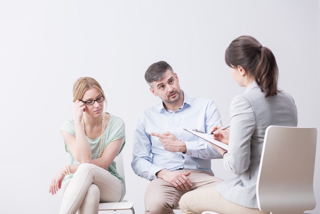 Divorce Mediator Listening to a Couple