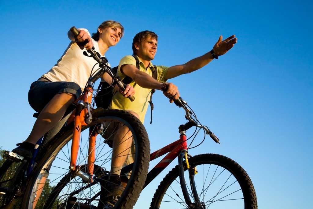 Couple riding bikes