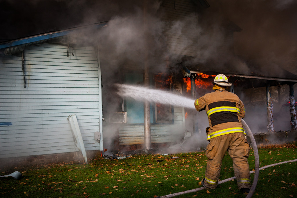 fire fighter putting out fire